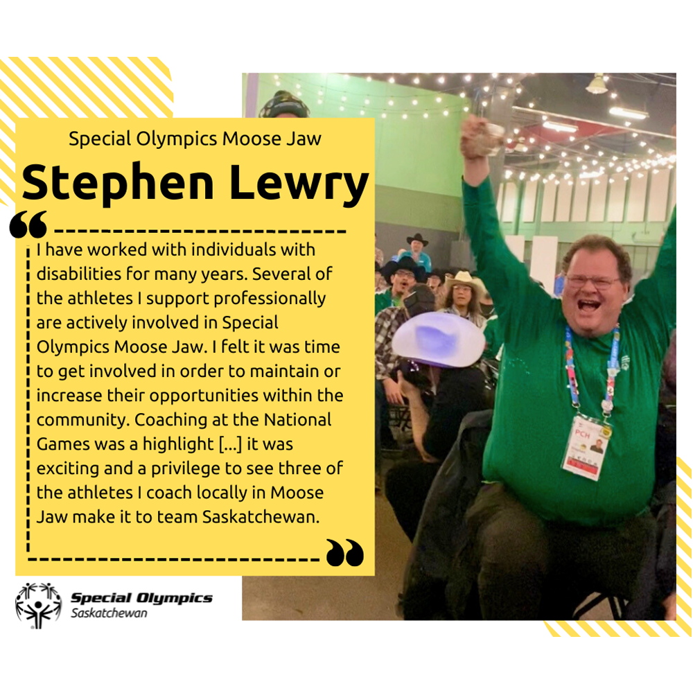 A photo of Stephen Lewry wearing a long sleeve green shirt and smiling and cheering happily.