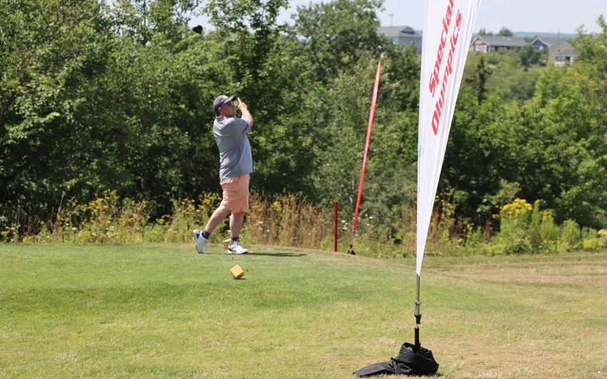 Special Olympics PEI, Golf, Athlete Golfing 
