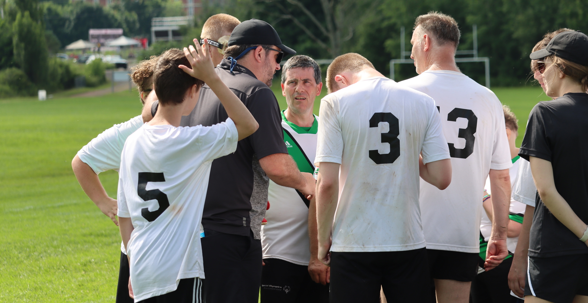 Special Olympics PEI, Soccer, Coach with Athletes